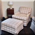 F26. Plaid club chair and matching ottoman. 